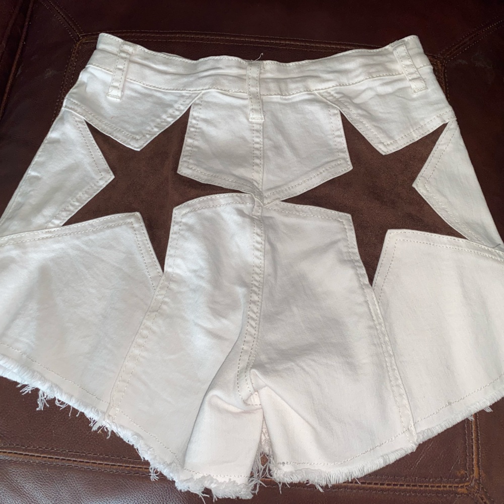 brown star white shorts